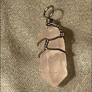 Beautiful pink crystal pendant with twisted wire